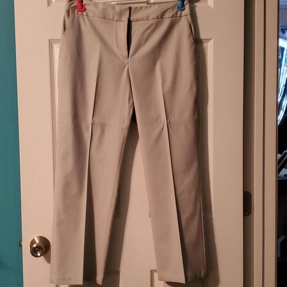 Cream colored dress pants.